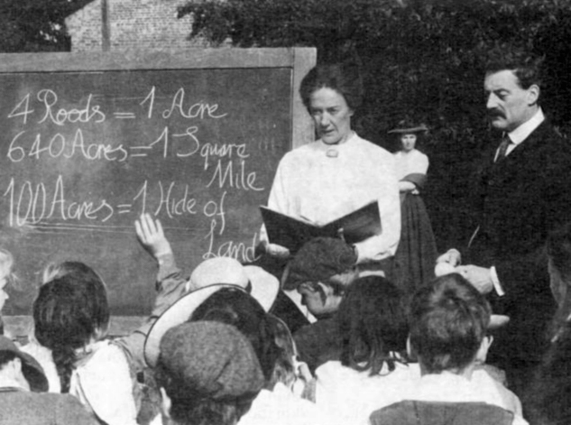 Kitty and Tom Higdon teaching on the green (from the Burston Rebellion)